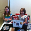 My girls Lexie & Bethany, taking care of my product table.